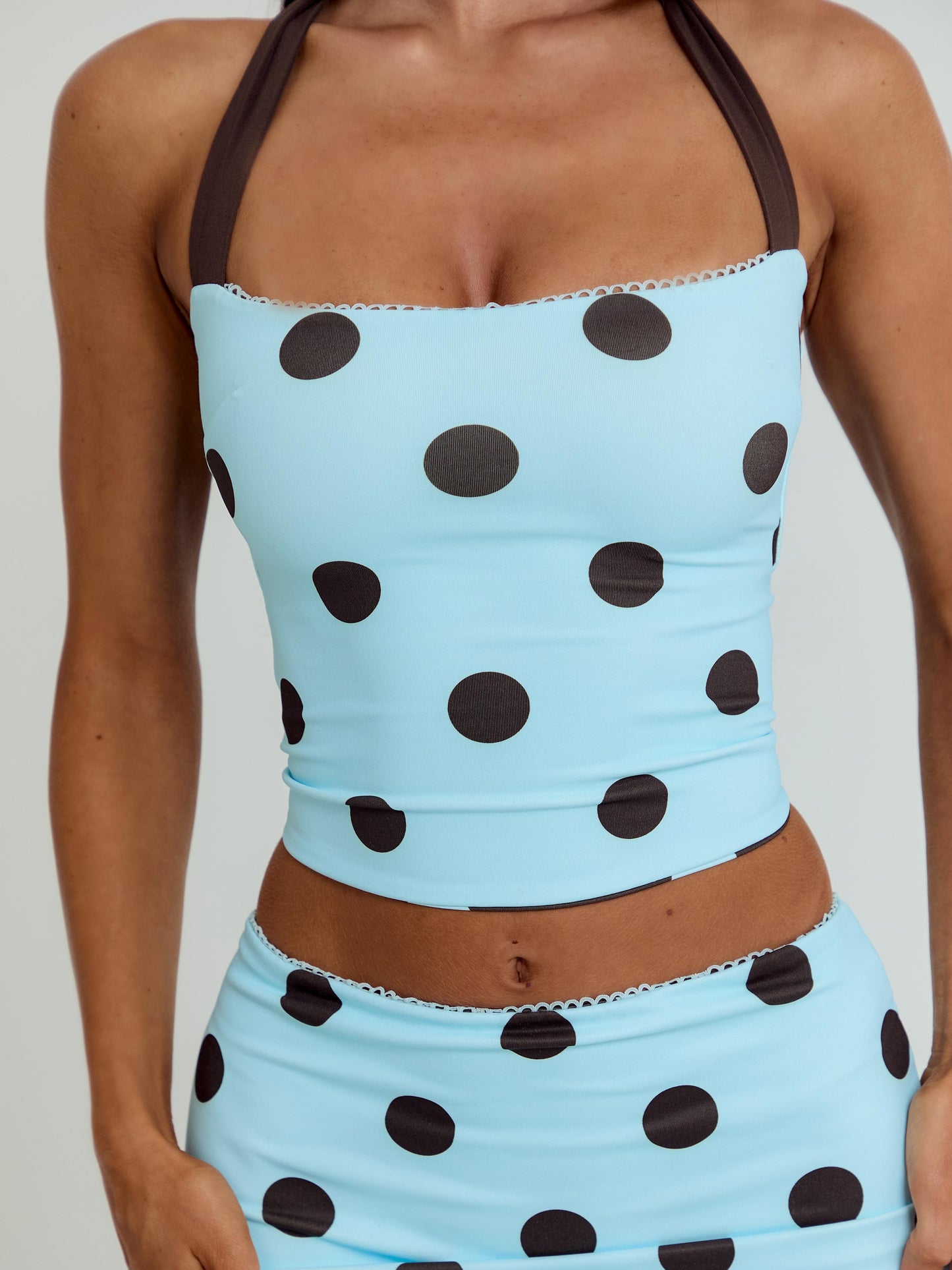 LULA REVERSIBLE TOP BLUE AND CHOCOLATE POLKA DOT